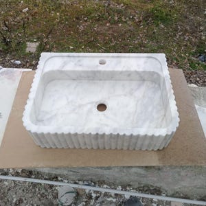 Luxury Carrara marble sink, wall mounted marble basin, floating bathroom sink, natural stone vanity, Italian marble washbasin, handcrafted marble sink, single block stone sink, modern luxury bathroom, designer vanity sink, premium stone basin, countertop vessel sink, custom size marble sink, spa style bathroom, boutique hotel bathroom, high end bathroom renovation