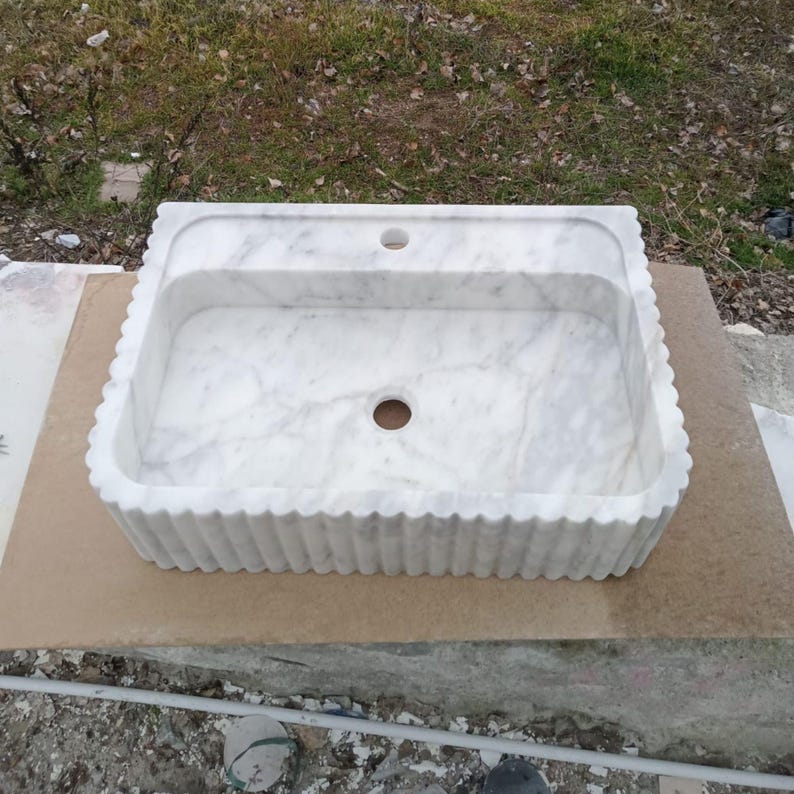 Luxury Carrara marble sink, wall mounted marble basin, floating bathroom sink, natural stone vanity, Italian marble washbasin, handcrafted marble sink, single block stone sink, modern luxury bathroom, designer vanity sink, premium stone basin, countertop vessel sink, custom size marble sink, spa style bathroom, boutique hotel bathroom, high end bathroom renovation