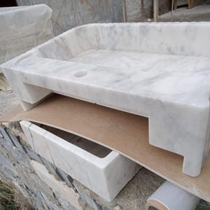 Luxury Carrara marble sink, wall mounted marble basin, floating bathroom sink, natural stone vanity, Italian marble washbasin, handcrafted marble sink, single block stone sink, modern luxury bathroom, designer vanity sink, premium stone basin, countertop vessel sink, custom size marble sink, spa style bathroom, boutique hotel bathroom, high end bathroom renovation