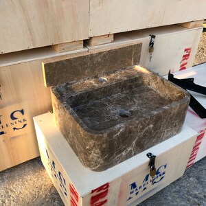Dark Emperador Marble Sink
Luxury Brown Stone Basin
Wall Mount Or Countertop
Rich Natural Veining
Handcrafted From Solid Marble
Custom Sizes Available
Perfect For Powder Rooms
Made By Stone Artisans
Secure Crated Shipping
Designed For Luxury Bathrooms