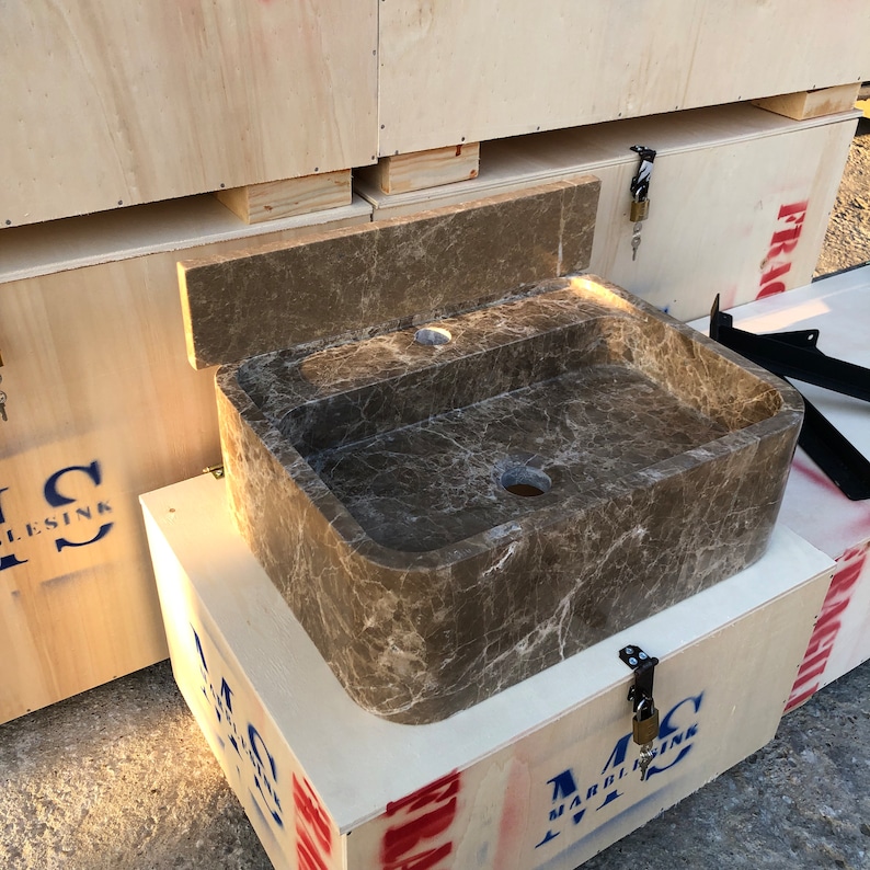 Dark Emperador Marble Sink
Luxury Brown Stone Basin
Wall Mount Or Countertop
Rich Natural Veining
Handcrafted From Solid Marble
Custom Sizes Available
Perfect For Powder Rooms
Made By Stone Artisans
Secure Crated Shipping
Designed For Luxury Bathrooms