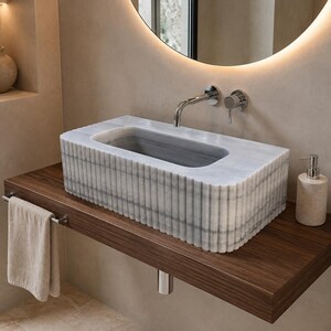 carrara-marble-sink-modern-powder-room.jpg