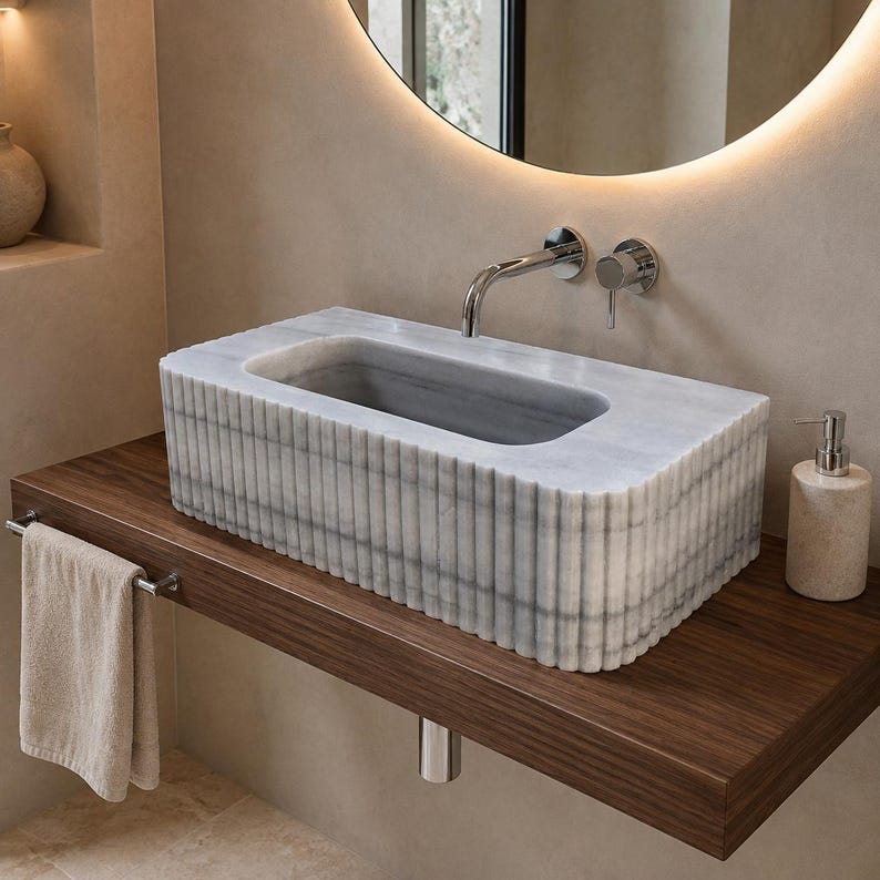 carrara-marble-sink-modern-powder-room.jpg