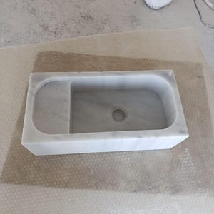 carrara-marble-bathroom-sink-detail.jpg