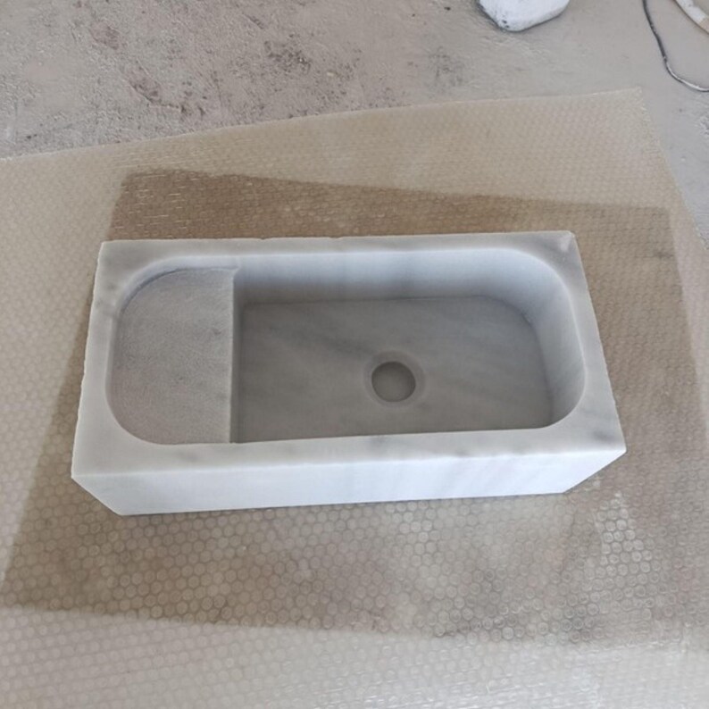 carrara-marble-bathroom-sink-detail.jpg
