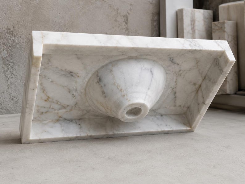 Calacatta Gold marble vessel sink displayed as a countertop bathroom basin, handmade from real natural stone with polished surface and luxury veining