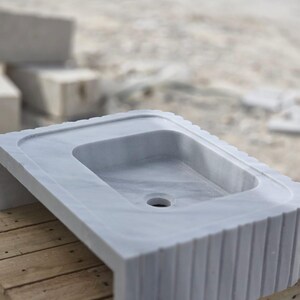 Multiple size options available for handcrafted white marble vessel sink select your dimensions from the dropdown menu