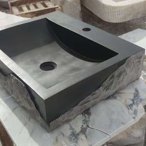 🖤 Discover the timeless beauty of our handcrafted rectangular black lava stone sink, carved from natural volcanic basalt. Perfect for wall-mounted, countertop, or vessel installations. Each piece is uniquely veined and artisan-crafted for luxury bathrooms. A bold statement for modern interior design. Durable, water-resistant, and shipped worldwide in a protective wooden crate via DHL Express.