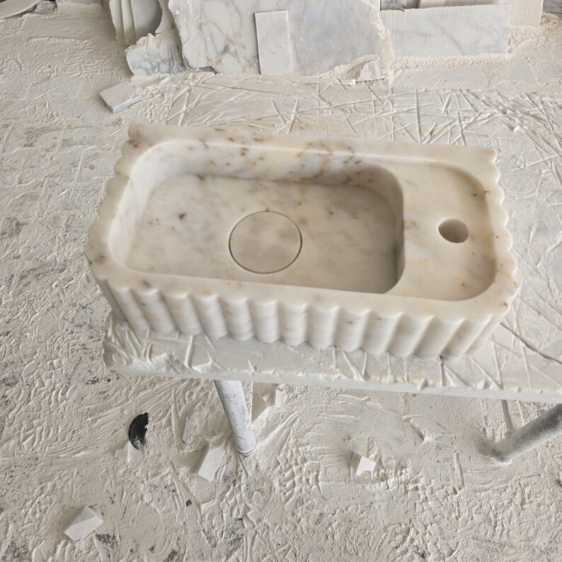 Handcrafted marble sink, Carrara marble basin, custom stone washbasin for bathroom, wall mounted and countertop vessel sink, natural stone vanity bowl, luxury bathroom design, Italian marble handmade sink, unique veined stone, elegant bathroom interior, artisanal stonework, real marble powder room sink, modern minimalist bathroom decor, durable and stylish marble sink, bathroom remodel ideas, hotel and yacht sink design