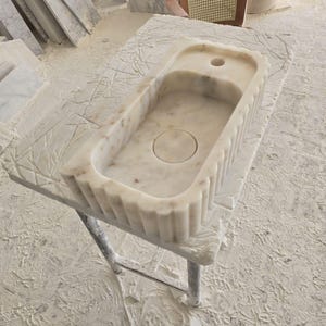 Handcrafted marble sink, Carrara marble basin, custom stone washbasin for bathroom, wall mounted and countertop vessel sink, natural stone vanity bowl, luxury bathroom design, Italian marble handmade sink, unique veined stone, elegant bathroom interior, artisanal stonework, real marble powder room sink, modern minimalist bathroom decor, durable and stylish marble sink, bathroom remodel ideas, hotel and yacht sink design