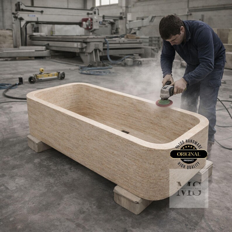 May include: A rectangular, light-colored wooden bathtub is being sanded by a person in a workshop. The tub is supported by wooden blocks. The image includes the text "ORIGINAL PRODUCT HIGH QUALITY".