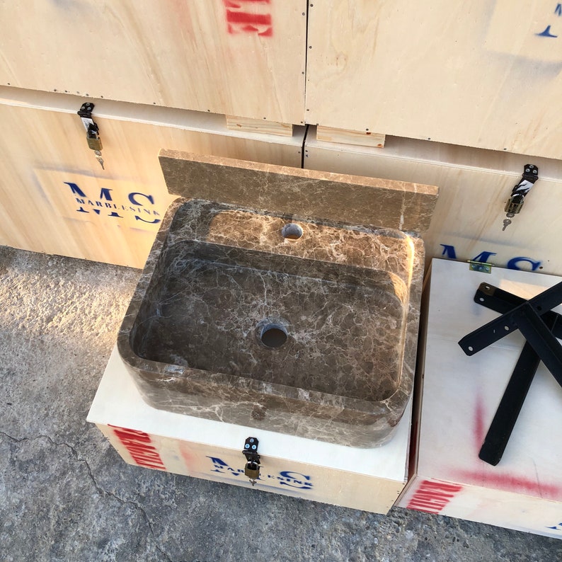 Dark Emperador Marble Sink
Luxury Brown Stone Basin
Wall Mount Or Countertop
Rich Natural Veining
Handcrafted From Solid Marble
Custom Sizes Available
Perfect For Powder Rooms
Made By Stone Artisans
Secure Crated Shipping
Designed For Luxury Bathrooms