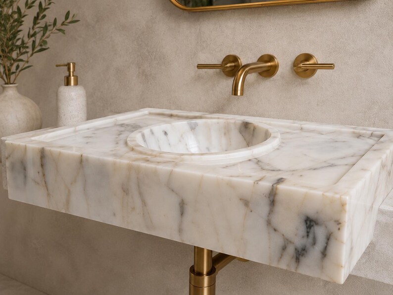 handmade-marble-vessel-basin-bathroom-sink.jpg First processing stage of Calacatta marble block in the workshop, measured and precision cut before being shaped into a luxury stone sink