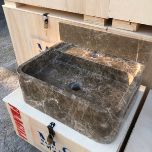 Dark Emperador Marble Sink
Luxury Brown Stone Basin
Wall Mount Or Countertop
Rich Natural Veining
Handcrafted From Solid Marble
Custom Sizes Available
Perfect For Powder Rooms
Made By Stone Artisans
Secure Crated Shipping
Designed For Luxury Bathrooms