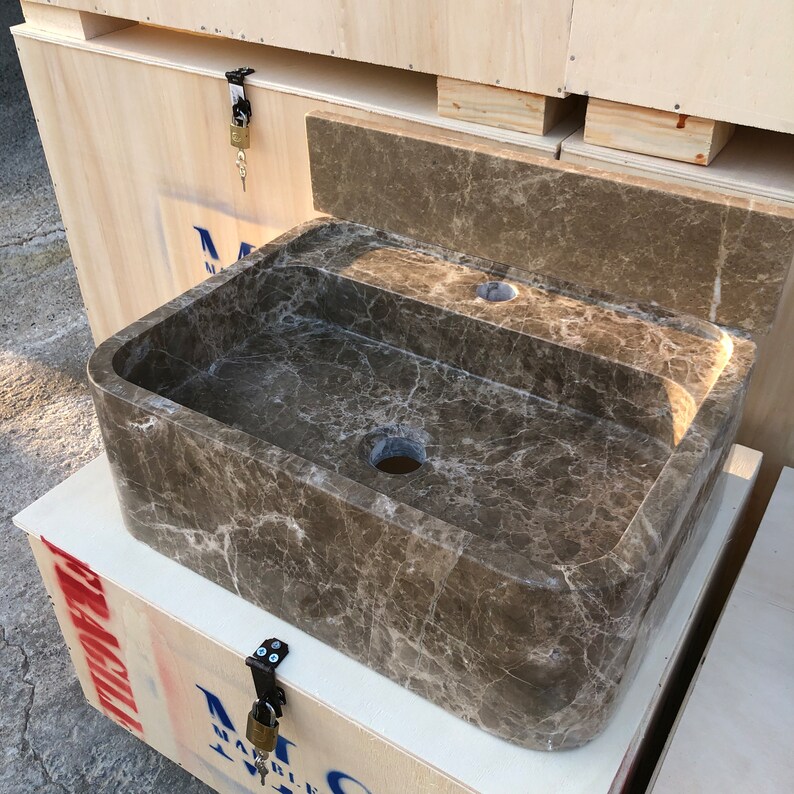 Dark Emperador Marble Sink
Luxury Brown Stone Basin
Wall Mount Or Countertop
Rich Natural Veining
Handcrafted From Solid Marble
Custom Sizes Available
Perfect For Powder Rooms
Made By Stone Artisans
Secure Crated Shipping
Designed For Luxury Bathrooms