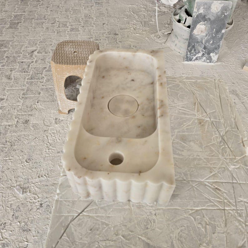 Handcrafted marble sink, Carrara marble basin, custom stone washbasin for bathroom, wall mounted and countertop vessel sink, natural stone vanity bowl, luxury bathroom design, Italian marble handmade sink, unique veined stone, elegant bathroom interior, artisanal stonework, real marble powder room sink, modern minimalist bathroom decor, durable and stylish marble sink, bathroom remodel ideas, hotel and yacht sink design