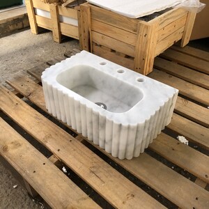 #HandCarvedSink #CarraraMarbleSink #CustomizableVanityTop #CustomizableSink #BathroomSink #PowderRoomSink #FarmhouseSink #RareUniqueItem #WallMountSink #VesselSink #NaturalStoneSink #LuxuryBathroomSink #ElegantBathroomDecor