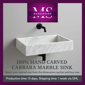 carrara marble sink,hand carved sink,wall mount sink,vanity top sink,custom marble sink,half polished sink,luxury bathroom,bathroom basin,stone vanity,powder room sink,artisan sink,natural stone sink,marble bathroom