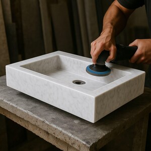 carrara marble sink,hand carved sink,wall mount sink,vanity top sink,custom marble sink,half polished sink,luxury bathroom,bathroom basin,stone vanity,powder room sink,artisan sink,natural stone sink,marble bathroom