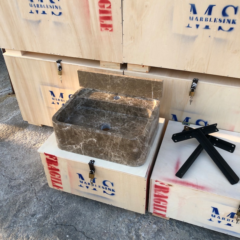 Dark Emperador Marble Sink
Luxury Brown Stone Basin
Wall Mount Or Countertop
Rich Natural Veining
Handcrafted From Solid Marble
Custom Sizes Available
Perfect For Powder Rooms
Made By Stone Artisans
Secure Crated Shipping
Designed For Luxury Bathrooms