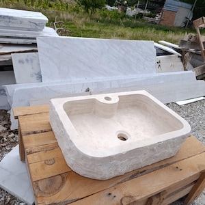 travertine sink
travertine vessel sink
natural stone sink
stone bathroom sink
hand carved stone sink
natural stone vessel basin
split face sink
rustic bathroom sink
beige bathroom sink
stone vanity sink
bathroom vessel basin
travertine bathroom basin
luxury bathroom sink
custom stone sink
powder room sink
organic modern bathroom
Mediterranean bathroom sink
spa bathroom sink
hotel bathroom sink
handmade stone basin