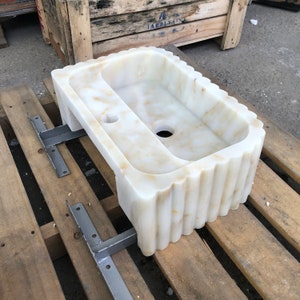 #HandCarvedSink #CalacattaViolaMarble #CustomizableVanityTop #CustomizableSink #BathroomSink #PowderRoomSink #FarmhouseSink #RareUniqueItem #WallMountSink #VesselSink #NaturalStoneSink #MarbleBathroomSink #LuxuryBathroomDecor #MarbleSinkCo