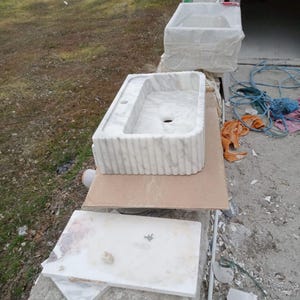 Luxury Carrara marble sink, wall mounted marble basin, floating bathroom sink, natural stone vanity, Italian marble washbasin, handcrafted marble sink, single block stone sink, modern luxury bathroom, designer vanity sink, premium stone basin, countertop vessel sink, custom size marble sink, spa style bathroom, boutique hotel bathroom, high end bathroom renovation