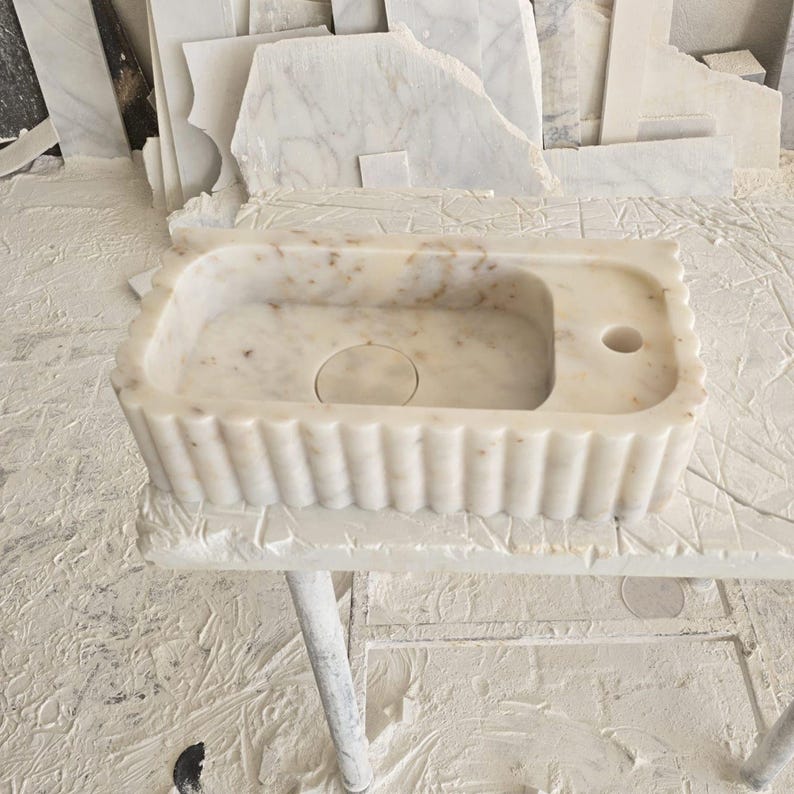 Handcrafted marble sink, Carrara marble basin, custom stone washbasin for bathroom, wall mounted and countertop vessel sink, natural stone vanity bowl, luxury bathroom design, Italian marble handmade sink, unique veined stone, elegant bathroom interior, artisanal stonework, real marble powder room sink, modern minimalist bathroom decor, durable and stylish marble sink, bathroom remodel ideas, hotel and yacht sink design