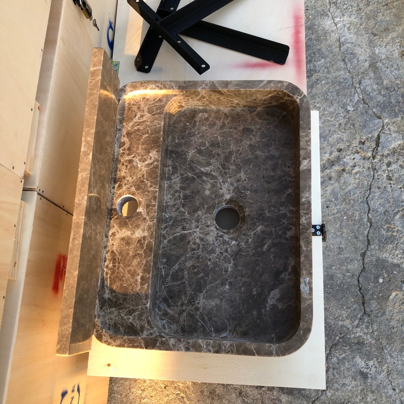 Dark Emperador Marble Sink
Luxury Brown Stone Basin
Wall Mount Or Countertop
Rich Natural Veining
Handcrafted From Solid Marble
Custom Sizes Available
Perfect For Powder Rooms
Made By Stone Artisans
Secure Crated Shipping
Designed For Luxury Bathrooms
