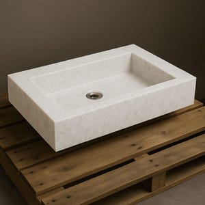 carrara marble sink,hand carved sink,wall mount sink,vanity top sink,custom marble sink,half polished sink,luxury bathroom,bathroom basin,stone vanity,powder room sink,artisan sink,natural stone sink,marble bathroom