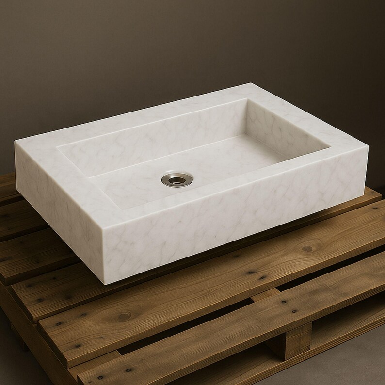 carrara marble sink,hand carved sink,wall mount sink,vanity top sink,custom marble sink,half polished sink,luxury bathroom,bathroom basin,stone vanity,powder room sink,artisan sink,natural stone sink,marble bathroom