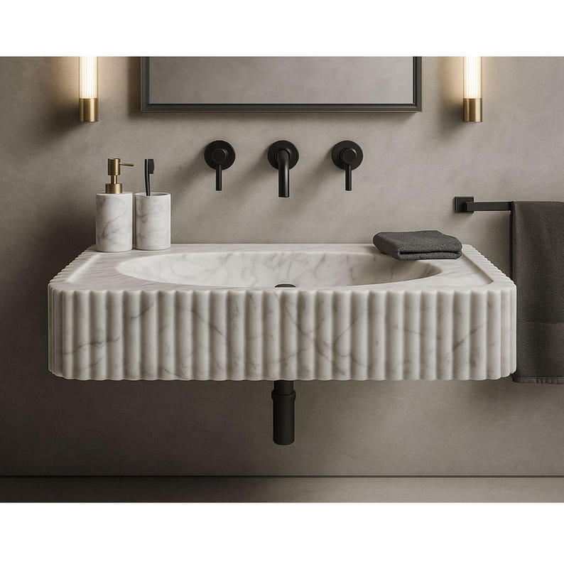 #CalacattaSink #WallMountSink #LuxuryBathroom #InteriorDesign #BathroomRenovation #BathroomRemodel #MarbleBasin #ProBathroomSpec #DesignerBathrooms #HomeImprovement #HighEndRenovation #ArchitectsChoice #BathroomInspiration