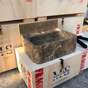 Dark Emperador Marble Sink
Luxury Brown Stone Basin
Wall Mount Or Countertop
Rich Natural Veining
Handcrafted From Solid Marble
Custom Sizes Available
Perfect For Powder Rooms
Made By Stone Artisans
Secure Crated Shipping
Designed For Luxury Bathrooms