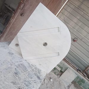 "Hand-carved Carrara marble sink – elegant, durable, and timeless. Perfect for luxury bathrooms, powder rooms, and boutique interiors. Custom sizes available: wall-mounted or countertop installation. Each piece features unique natural veining, adding character to your space. Discover our full collection of marble sinks, bathtubs, and stone accessories at MarbleSinkCo – follow us for more exclusive designs."