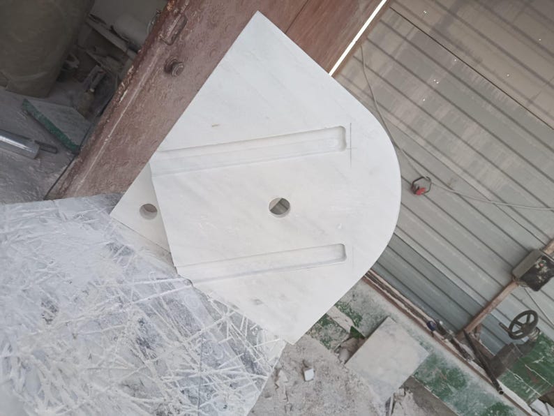 "Hand-carved Carrara marble sink – elegant, durable, and timeless. Perfect for luxury bathrooms, powder rooms, and boutique interiors. Custom sizes available: wall-mounted or countertop installation. Each piece features unique natural veining, adding character to your space. Discover our full collection of marble sinks, bathtubs, and stone accessories at MarbleSinkCo – follow us for more exclusive designs."