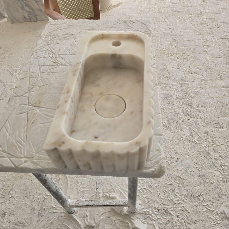 Handcrafted marble sink, Carrara marble basin, custom stone washbasin for bathroom, wall mounted and countertop vessel sink, natural stone vanity bowl, luxury bathroom design, Italian marble handmade sink, unique veined stone, elegant bathroom interior, artisanal stonework, real marble powder room sink, modern minimalist bathroom decor, durable and stylish marble sink, bathroom remodel ideas, hotel and yacht sink design