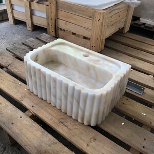 #HandCarvedSink #CalacattaViolaMarble #CustomizableVanityTop #CustomizableSink #BathroomSink #PowderRoomSink #FarmhouseSink #RareUniqueItem #WallMountSink #VesselSink #NaturalStoneSink #MarbleBathroomSink #LuxuryBathroomDecor #MarbleSinkCo