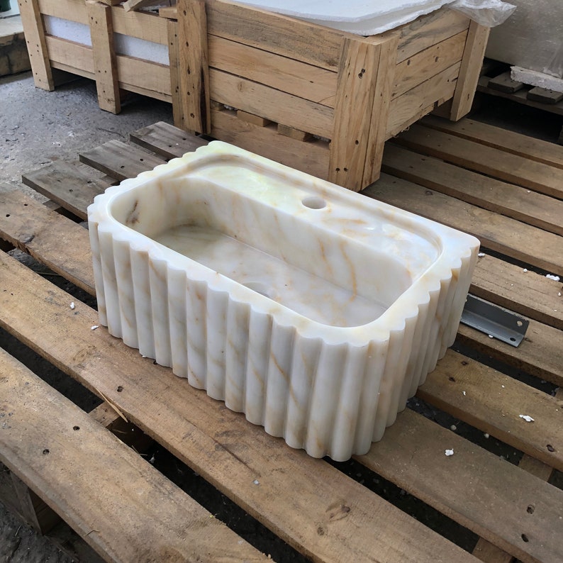 #HandCarvedSink #CalacattaViolaMarble #CustomizableVanityTop #CustomizableSink #BathroomSink #PowderRoomSink #FarmhouseSink #RareUniqueItem #WallMountSink #VesselSink #NaturalStoneSink #MarbleBathroomSink #LuxuryBathroomDecor #MarbleSinkCo