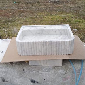 Luxury Carrara marble sink, wall mounted marble basin, floating bathroom sink, natural stone vanity, Italian marble washbasin, handcrafted marble sink, single block stone sink, modern luxury bathroom, designer vanity sink, premium stone basin, countertop vessel sink, custom size marble sink, spa style bathroom, boutique hotel bathroom, high end bathroom renovation