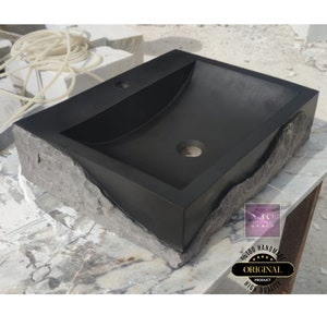 🖤 Discover the timeless beauty of our handcrafted rectangular black lava stone sink, carved from natural volcanic basalt. Perfect for wall-mounted, countertop, or vessel installations. Each piece is uniquely veined and artisan-crafted for luxury bathrooms. A bold statement for modern interior design. Durable, water-resistant, and shipped worldwide in a protective wooden crate via DHL Express.