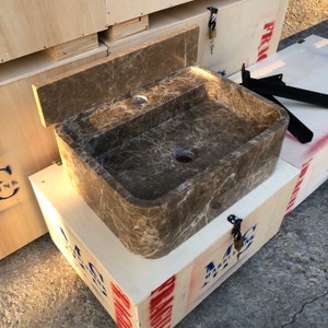 Dark Emperador Marble Sink
Luxury Brown Stone Basin
Wall Mount Or Countertop
Rich Natural Veining
Handcrafted From Solid Marble
Custom Sizes Available
Perfect For Powder Rooms
Made By Stone Artisans
Secure Crated Shipping
Designed For Luxury Bathrooms