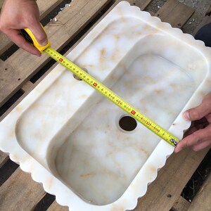 #HandCarvedSink #CalacattaViolaMarble #CustomizableVanityTop #CustomizableSink #BathroomSink #PowderRoomSink #FarmhouseSink #RareUniqueItem #WallMountSink #VesselSink #NaturalStoneSink #MarbleBathroomSink #LuxuryBathroomDecor #MarbleSinkCo