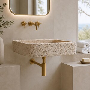 Hand carved travertine wall mounted sink