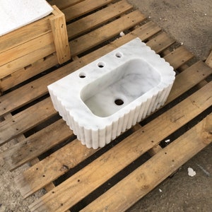 #HandCarvedSink #CarraraMarbleSink #CustomizableVanityTop #CustomizableSink #BathroomSink #PowderRoomSink #FarmhouseSink #RareUniqueItem #WallMountSink #VesselSink #NaturalStoneSink #LuxuryBathroomSink #ElegantBathroomDecor