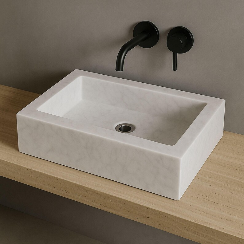 carrara marble sink,hand carved sink,wall mount sink,vanity top sink,custom marble sink,half polished sink,luxury bathroom,bathroom basin,stone vanity,powder room sink,artisan sink,natural stone sink,marble bathroom