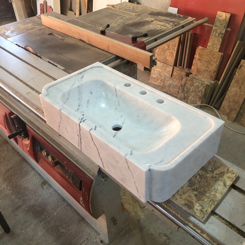carrara marble sink,
wall mount sink,
floating vanity,
3 hole marble sink,
custom marble basin,
white stone sink,
modern bathroom sink,
handmade wall sink,
european marble sink,
natural stone vanity,
luxury wall basin,
minimalist sink,
artisan marble sink