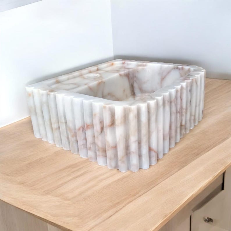 Handcarved sink, Carrara marble, Custom bathroom, Wall-mounted sink, Countertop basin, Rectangular sink, Marble vanity, Luxury bathroom, Modern design, Natural stone, Artisan crafted, Elegant decor, Bathroom remodel