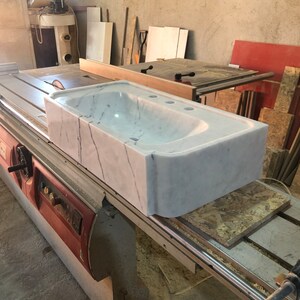 carrara marble sink,
wall mount sink,
floating vanity,
3 hole marble sink,
custom marble basin,
white stone sink,
modern bathroom sink,
handmade wall sink,
european marble sink,
natural stone vanity,
luxury wall basin,
minimalist sink,
artisan marble sink