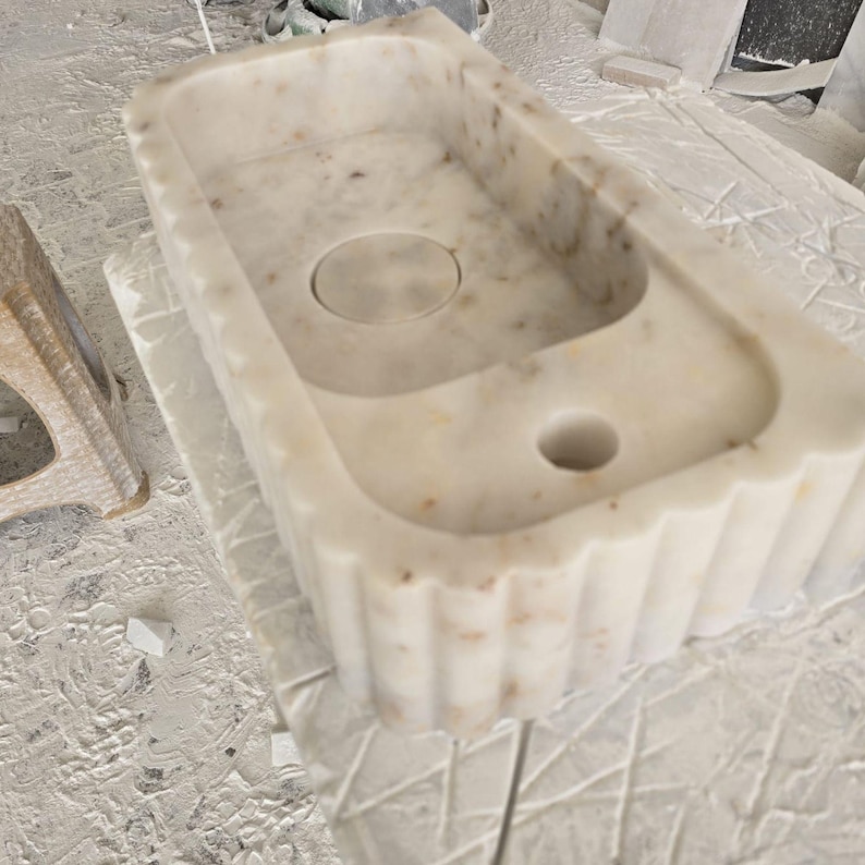 Handcrafted marble sink, Carrara marble basin, custom stone washbasin for bathroom, wall mounted and countertop vessel sink, natural stone vanity bowl, luxury bathroom design, Italian marble handmade sink, unique veined stone, elegant bathroom interior, artisanal stonework, real marble powder room sink, modern minimalist bathroom decor, durable and stylish marble sink, bathroom remodel ideas, hotel and yacht sink design