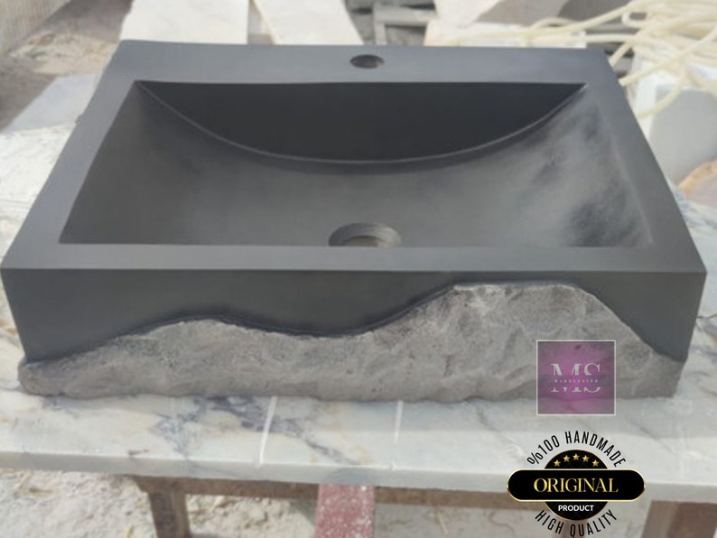 🖤 Discover the timeless beauty of our handcrafted rectangular black lava stone sink, carved from natural volcanic basalt. Perfect for wall-mounted, countertop, or vessel installations. Each piece is uniquely veined and artisan-crafted for luxury bathrooms. A bold statement for modern interior design. Durable, water-resistant, and shipped worldwide in a protective wooden crate via DHL Express.